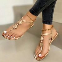 GILDED OVAL T-STRAP SANDALS
