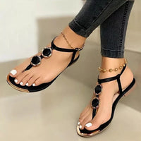 GILDED OVAL T-STRAP SANDALS