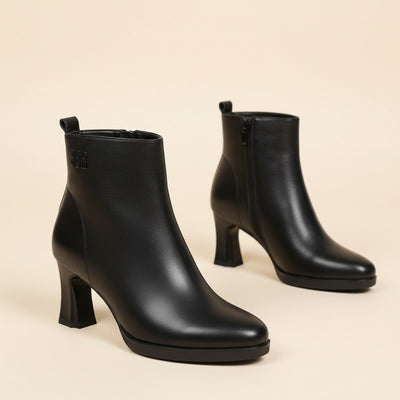 BLACK SCULPTED POINT ANKLE BOOT