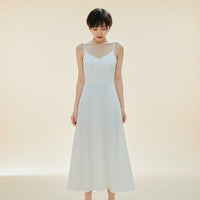 THE QUIET SLIP MIDI DRESS