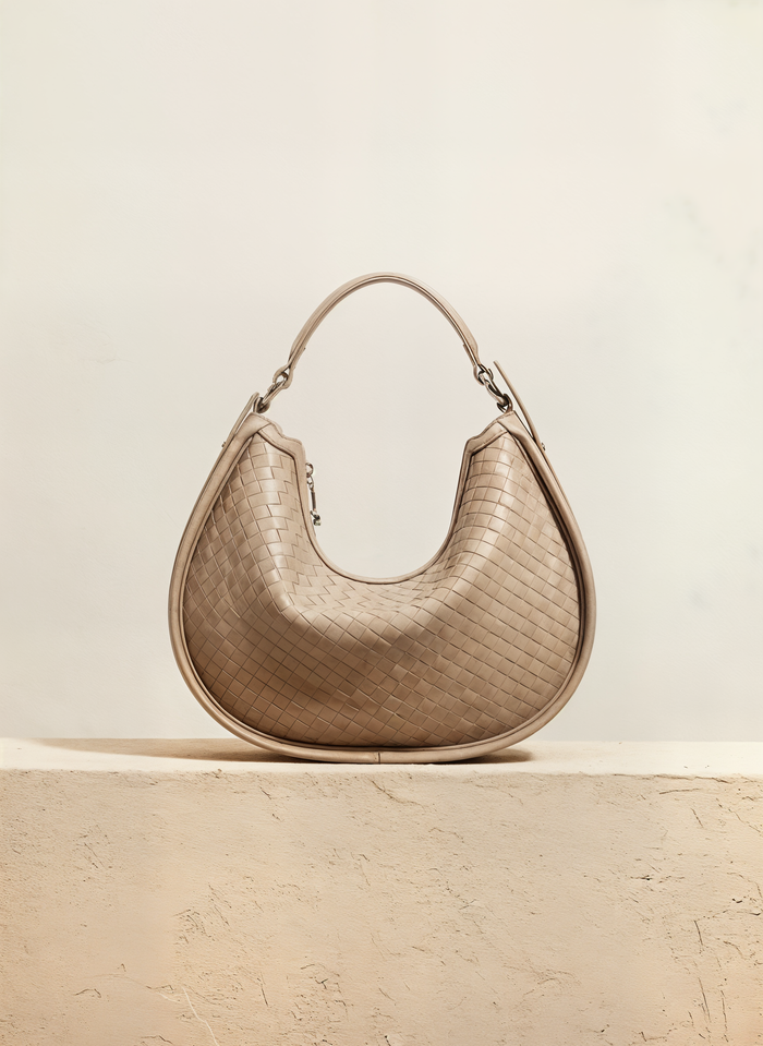 WOVEN CRESCENT LEATHER SHOULDER BAG