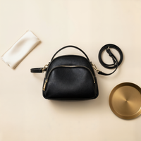PEBBLED DOME CROSSBODY BAG
