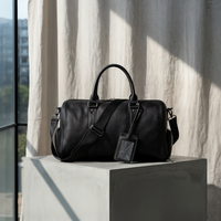 PEBBLED LEATHER WEEKEND HOLDALL