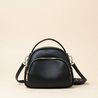 PEBBLED DOME CROSSBODY BAG