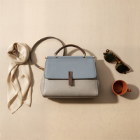 THE STRUCTURED TOP-HANDLE CROSSBODY