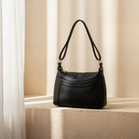 CRESCENT PEBBLED LEATHER SHOULDER BAG