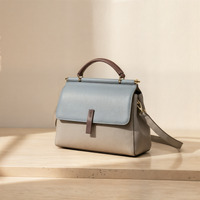 THE STRUCTURED TOP-HANDLE CROSSBODY