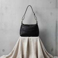 CRESCENT PEBBLED LEATHER SHOULDER BAG
