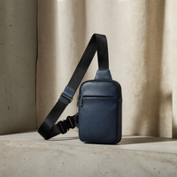 NAVY PEBBLED LEATHER CROSSBODY SLING